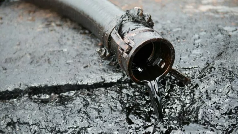 spill from industrial hose needing dry disconnect couplings